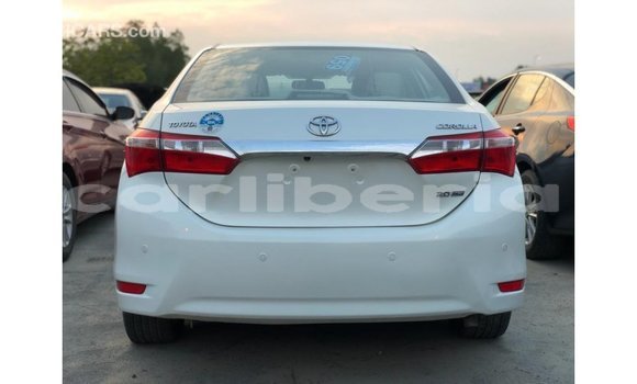 Buy Import Toyota Corolla White Car in Import - Dubai in Bomi County Buy Import Toyota Corolla White Car in Import - Dubai in Bomi County