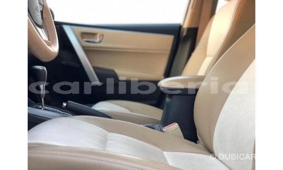 Buy Import Toyota Corolla White Car in Import - Dubai in Bomi County Buy Import Toyota Corolla White Car in Import - Dubai in Bomi County