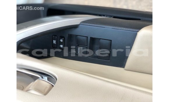 Buy Import Toyota Corolla White Car in Import - Dubai in Bomi County Buy Import Toyota Corolla White Car in Import - Dubai in Bomi County