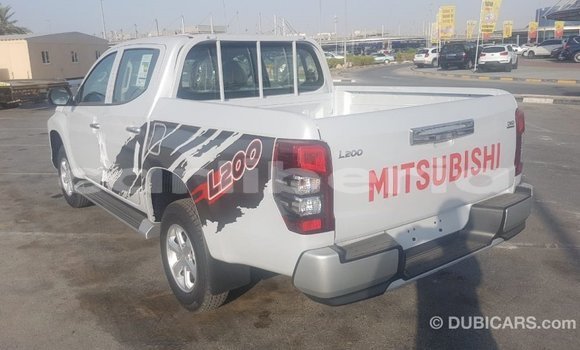 Buy Import Mitsubishi L200 White Car in Import - Dubai in Bomi County Buy Import Mitsubishi L200 White Car in Import - Dubai in Bomi County