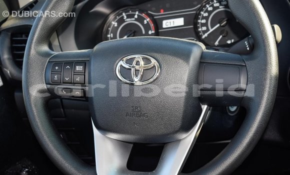 Buy Import Toyota Hilux White Car in Import - Dubai in Bomi County Buy Import Toyota Hilux White Car in Import - Dubai in Bomi County