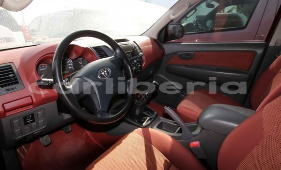 Buy Import Toyota Hilux Red Car in Import - Dubai in Bomi County Buy Import Toyota Hilux Red Car in Import - Dubai in Bomi County