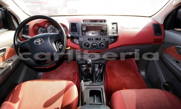 Buy Import Toyota Hilux Red Car in Import - Dubai in Bomi County Buy Import Toyota Hilux Red Car in Import - Dubai in Bomi County
