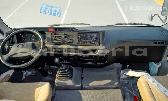 Buy Import Toyota Coaster White Car in Import - Dubai in Bomi County Buy Import Toyota Coaster White Car in Import - Dubai in Bomi County